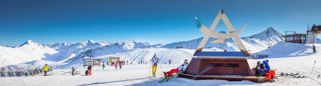 Skiers skiing in Carosello 3000 ski resort