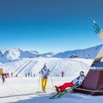 Skiers skiing in Carosello 3000 ski resort